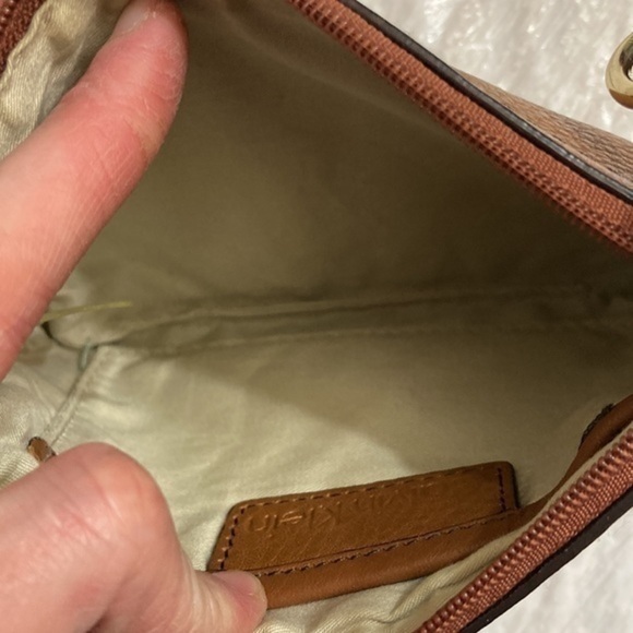 Calvin Klein brown wristlet bag